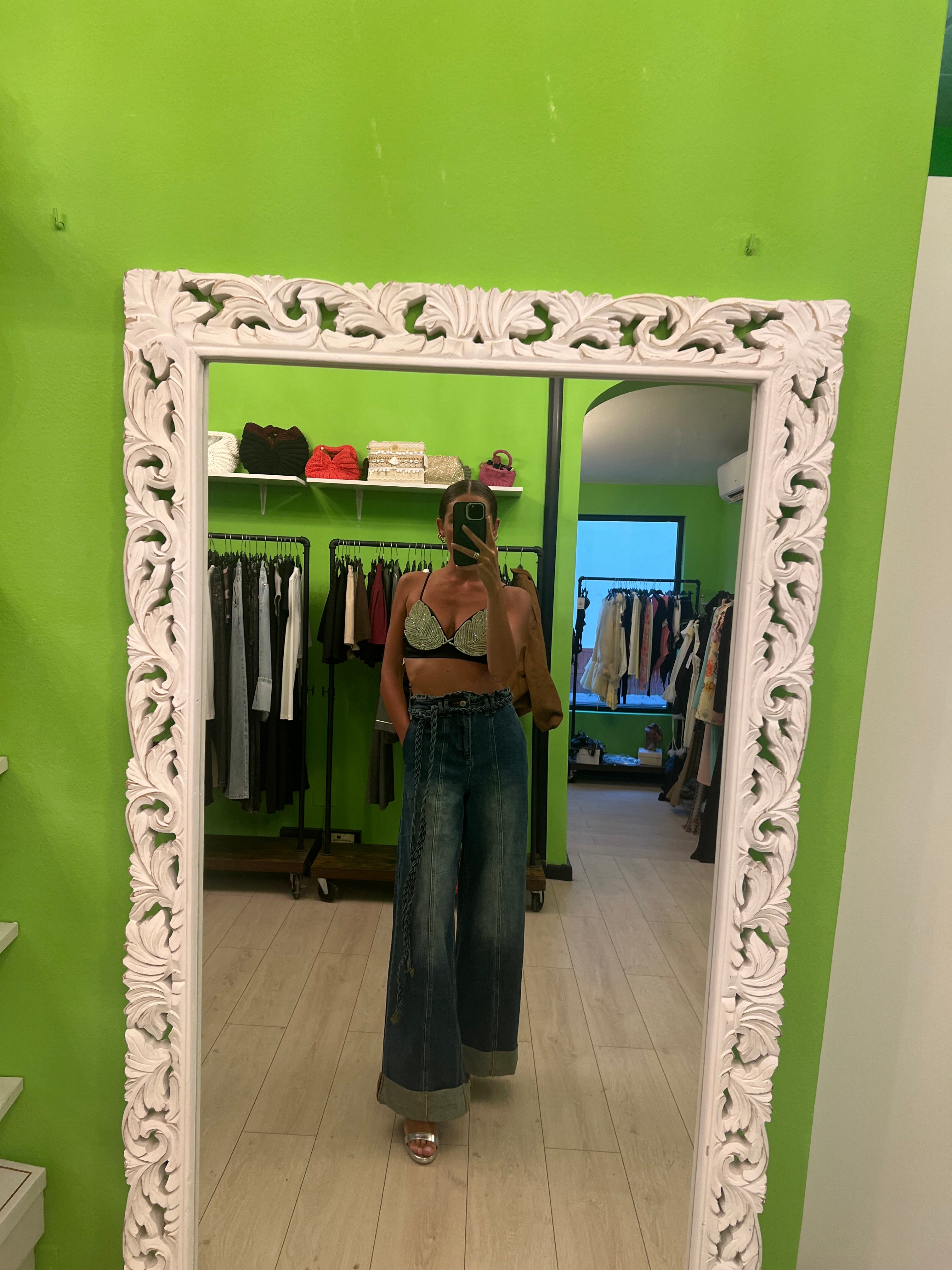 Jeans largo con cintura treccia